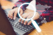 blurred Businessman use laptop for search with search engine icon magnifying glass globe.Searching information data on internet.Search engine interview job.job hire on website.investigate.seo business
