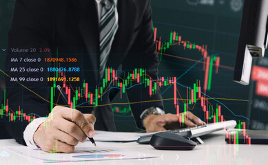 business people analyze financial graphs stock market concept with technology