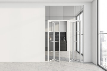 Framed glass folding door with industrial white and black kitchen on background