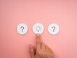© tete_escape - The solution, creative idea, and innovation, searching answer for success concepts, minimal style. Light bulb and question mark icon symbol on white round sponge with choosing hand on pink background.
