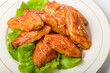 A plate of Orleans grilled chicken wings