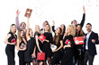 © BestForYou - Group portrait of cheerful guests in stylish black clothes for the New Year or birthday. Young people with gifts
