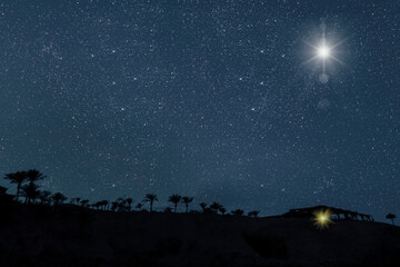 the star shines over the manger of christmas of jesus christ. panorama