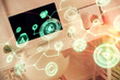 © peshkova - Double exposure of social network theme drawing and office interior background. Concept of web.
