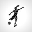 Women Soccer. Girl football player silhouette kicks the ball