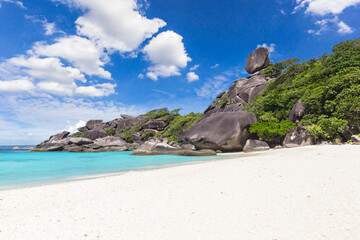 Wall Mural - Beautiful sandy beach with wave crashing on sandy shore at Similan Islands Beautiful tropical sea Similan island Thailand