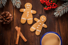 Gingerbread Man Cookies And Coffee Cup By Horizontal Angle.