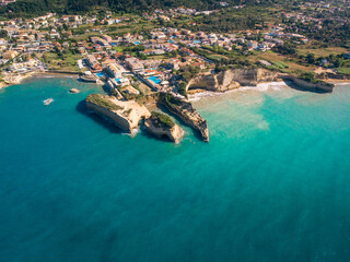 Wall Mural - Aerial view of beautiful beach with blue water. Channel of Love on island of Corfu, Greece. Sidari city.