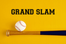 Baseball Bat And A Ball On Yellow Background With The Word Grand Slam