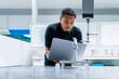 © Westend61 - Engineer with laptop working at manufacturing factory