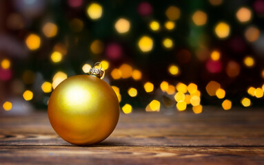 Wall Mural - close-up christmas ornament on background of defocused lights