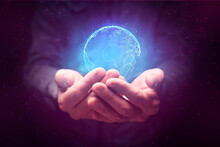 Man Having The Metaverse World In Palm Of His Cupped Hands Hand, Conceptual Image