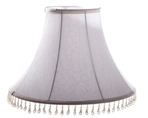 Wall Mural - classic cut corner bell shaped grey tapered lampshade with a beaded fringe on a white background isolated close up shot