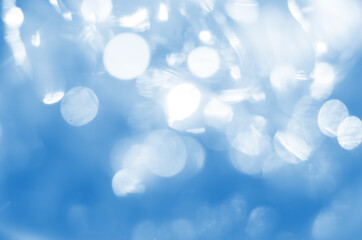 Wall Mural - defocused lights on blue background