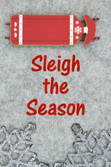 Wall Mural - Sleigh the Season message with red and white winter sled