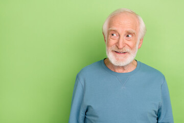 Sticker - Photo of funny old beard man look empty space wear blue sweater isolated on green color background