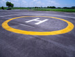 Private Helicopter sing parking area in airport