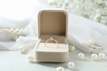 Concept Of Wedding Accessories With Wedding Ring, Close Up