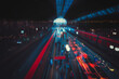 © Andre Nery - Abstract city night blurred light double exposure moving train and people background. Concept image.