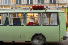 Many Ded Moroz (Santa Claus) Ride The Bus In The City And Pose For People.
