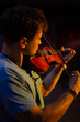 © Hennadii - A man plays the violin on the stage of close