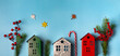 © RooM The Agency - Conceptual flatlay of a festive Christmas street with a row of houses on a winter night