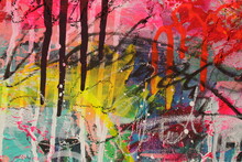 This Abstract Graffiti Style Painting Features Bright Colors With Scribbles And Drips For Backgrounds.