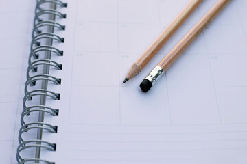 Pencil on notebooks or paper on white background