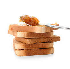 Tasty pear jam and bread on white background