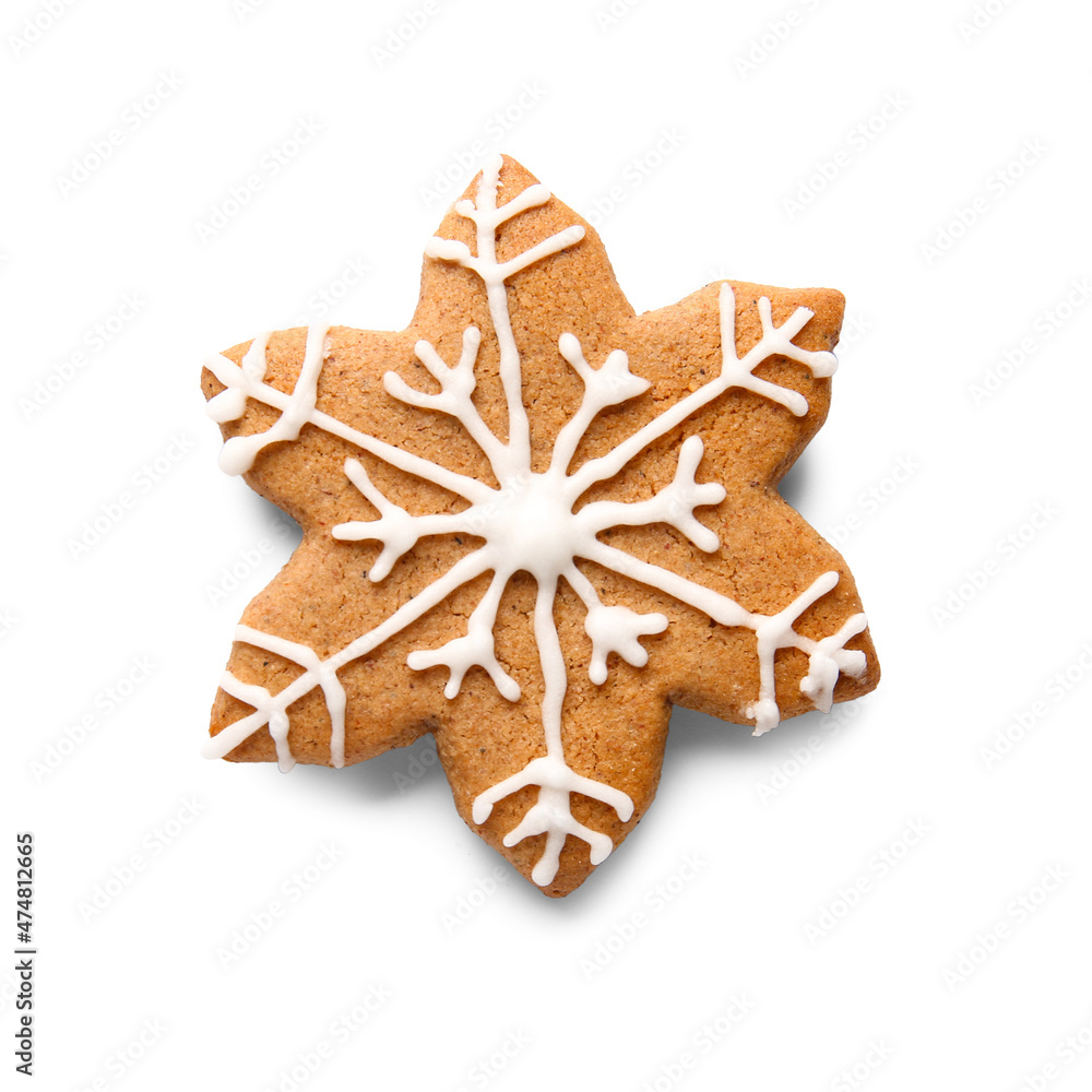 Tasty gingerbread cookie in shape of snowflake on white background