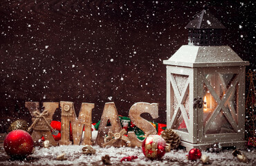 Wall Mural - Christmas Lantern on snowy table with festive decoration.