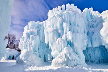 Wall Mural - Winter ice and snow castle built in the freezing cold on a subzero sunny day