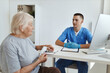 © SHOTPRIME STUDIO - an elderly woman is examined by a doctor diagnostics