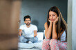 © NDABCREATIVITY - Couple having arguments and sexual problems in bed