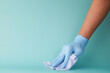 © Towfiqu Barbhuiya  - close up of person hand cleaning table with cloth