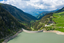 The Dam Of Saint Guerin In Europe, In France, Towards Beaufort, In The Alps, In Summer, On A Sunny Day.