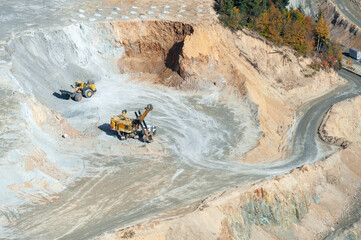 heavy machinery at rosia poieni surface copper mine, romania, alba county