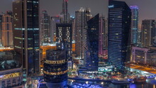 Dubai Marina Skyline With JLT District Skyscrapers On A Background Aerial Night To Day Timelapse.