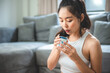 © chokniti - Asian woman person relaxing with hot tea to drink at home, tea cup for happy lifestyle in morning