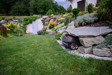 Stone Shelter For A Robotic Lawnmower.