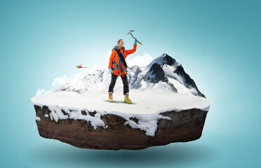 Canvas Print - Mountaineer reaches the top of a snowy mountain