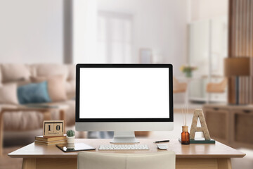Workplace with modern computer on wooden table indoors. Mockup for design