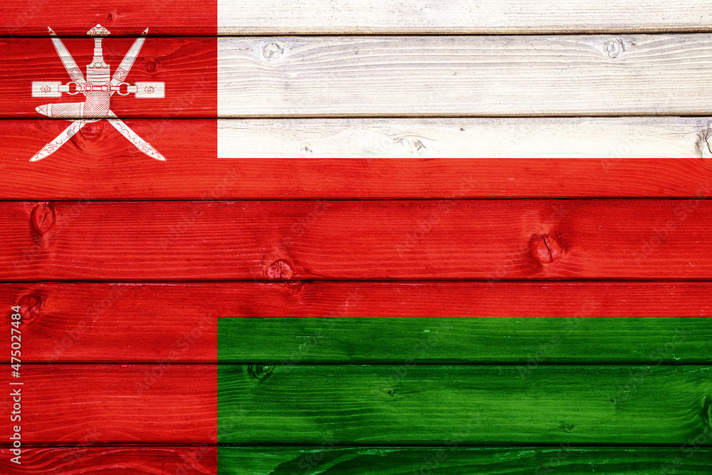 Flag of Oman on wooden surface Stock Photo | Adobe Stock