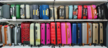 Set Of Colored Suitcases For Travel And Vacation.