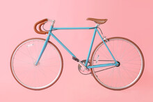Modern Bicycle On Pink Background