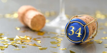 Champagne Cap With The Number 34