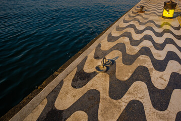 Wall Mural - IZMIR, TURKEY: Promenade with sea view and traditional pattern on the road in Izmir.