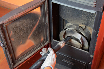 Clean the pellet stove with a vacuum cleaner, which is necessary for stove maintenance