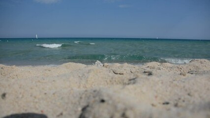 Wall Mural - Wiew of sea trough the sand of beach