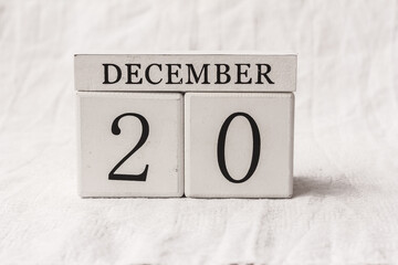 Save the date. December 20th. Day 20 of month, date calendar on white background.  White block calendar present date 20 and month December, Advent, special occasions, website events